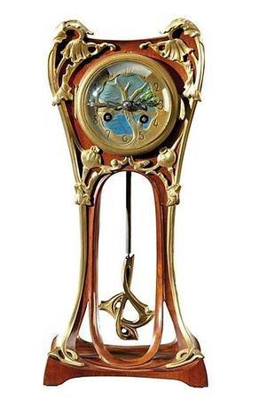 pendule art nouveau a balancier de 1900 Louis Majorelle